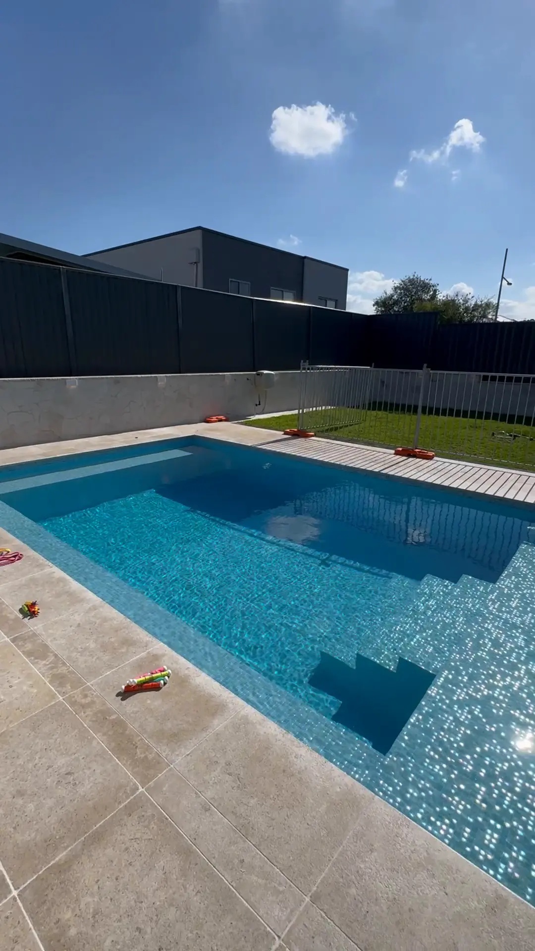 Finished inground pool with pool lighting and equipment wired by BPE Solutions near Camden